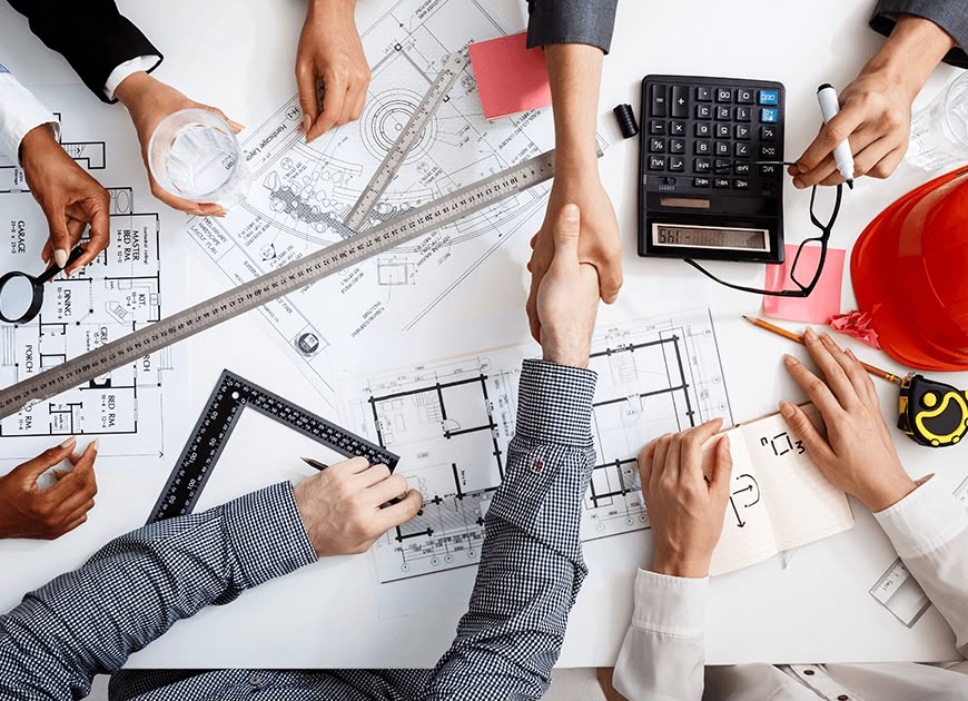 Civil engineer reviewing project plans on site — R G R INFRA project management consultancy